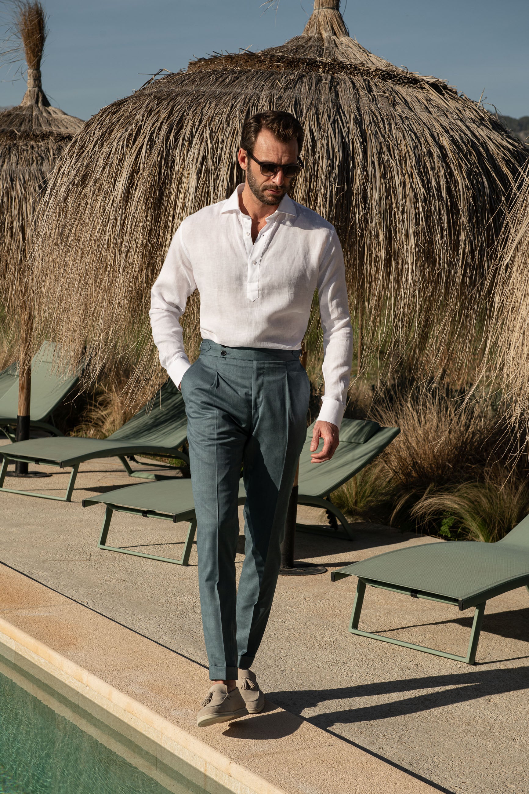 White shirt and olive green trouser.